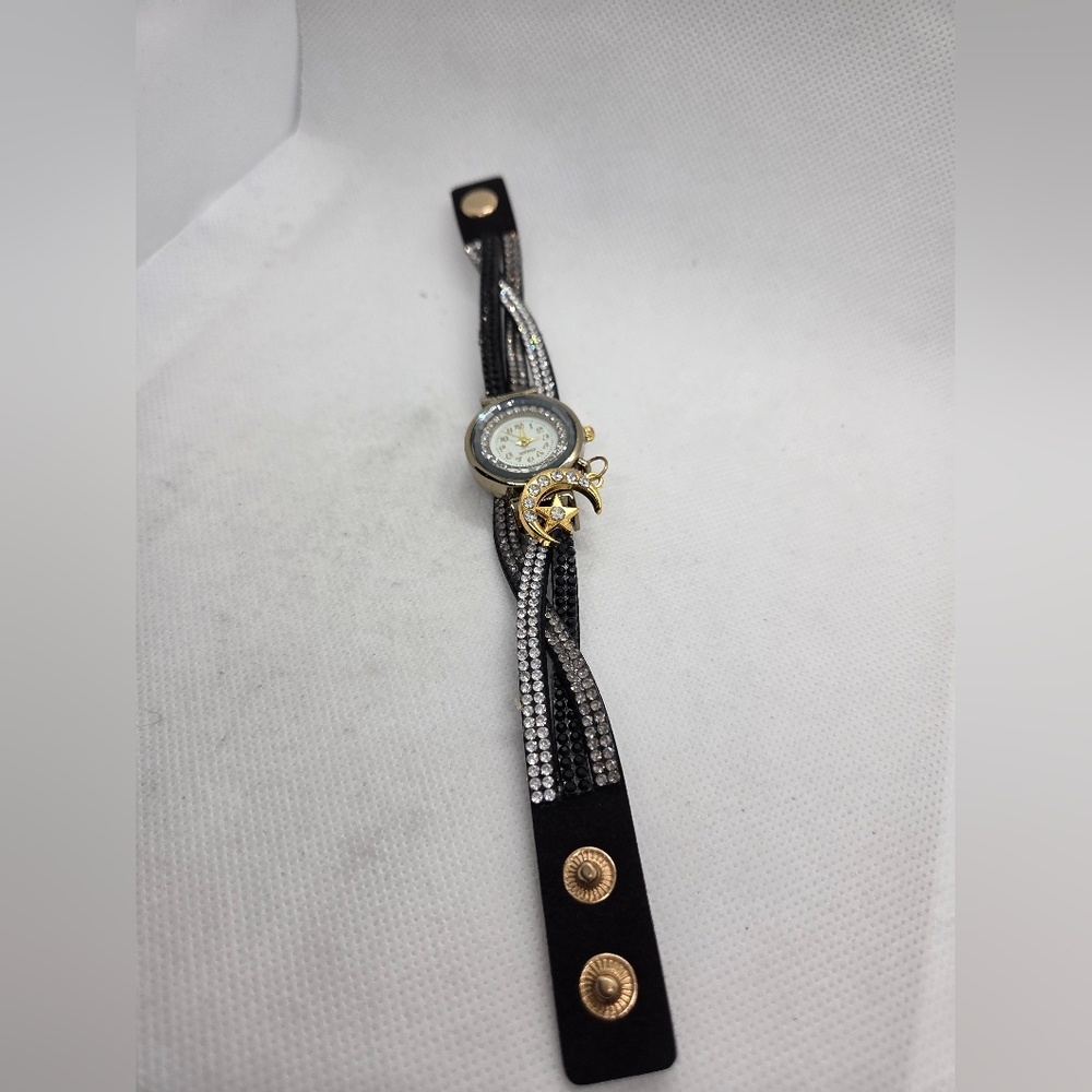 Gold and Black Women's Quartz Watch with Crystal And Leather Charm Accents - Picture 6 of 6